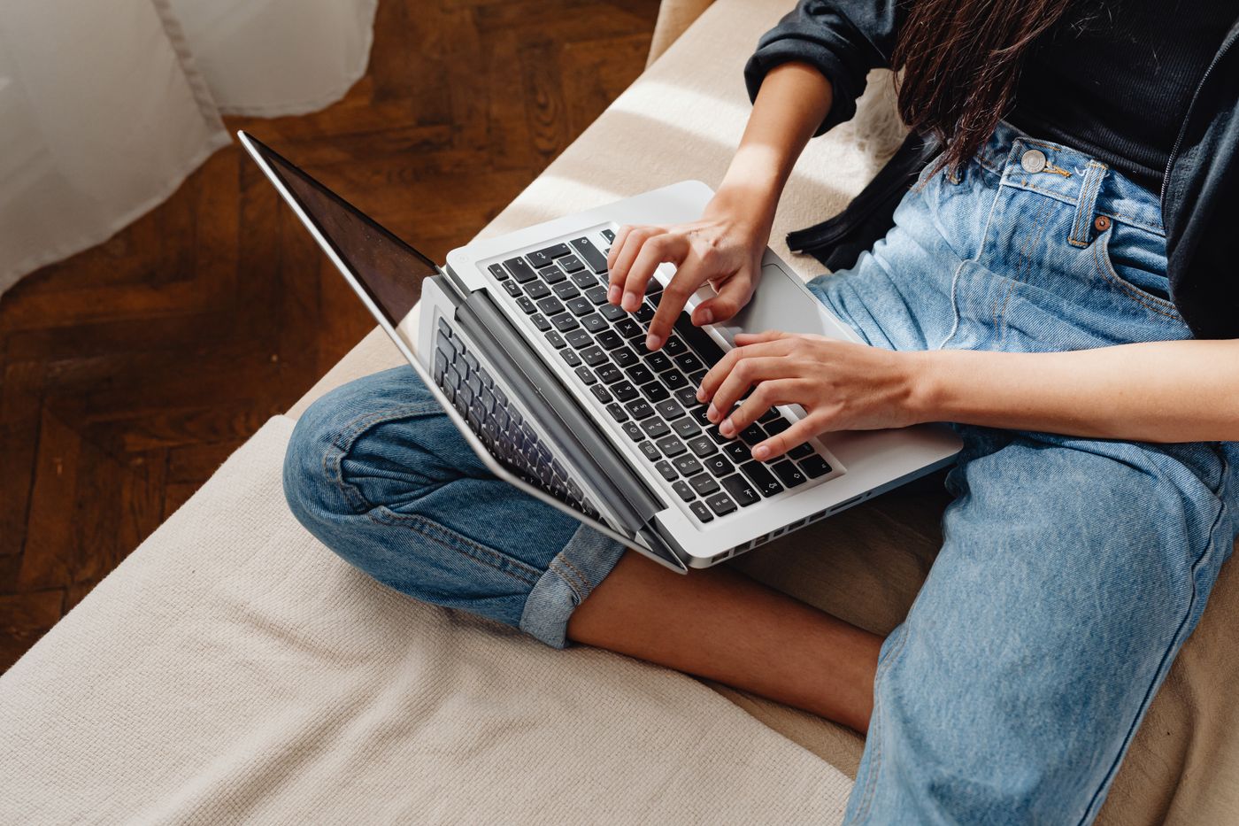 Someone working on a laptop at home
